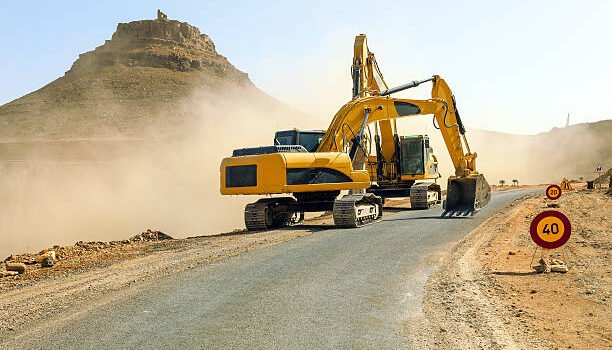 Two excavators working on the road N09 betwen Jbel Bani and Zagora.